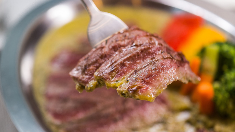 slices of meat with Café de Paris sauce