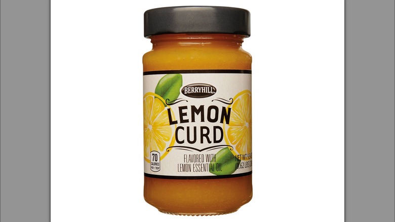 A glass jar filled with lemon curd