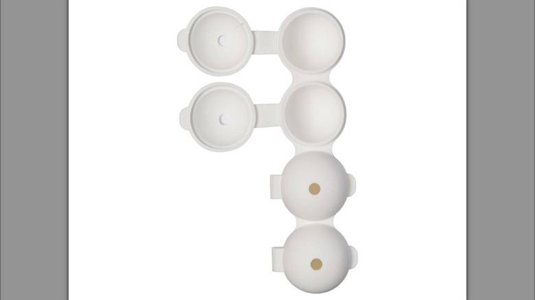 A silicone round ice cube tray