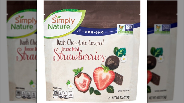 A closeup of a package of dark chocolate covered freeze-dried strawberries