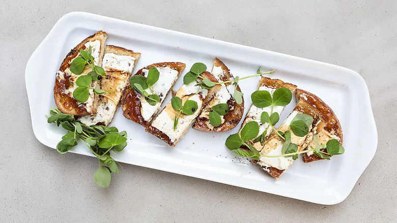 A white serving platter with food