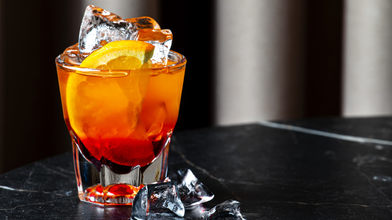 Bicicletta cocktail in rocks glass with orange wedge