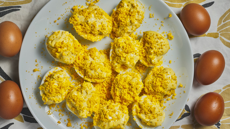 Deviled eggs with yellow seasoning