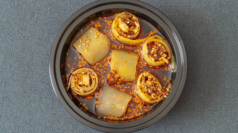 A bowl of Tibetan laphing with spicy chili sauce