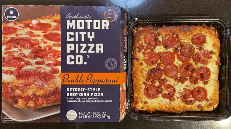 Pizza box with prepared pepperoni pizza