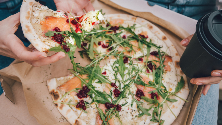 Pizza with salmon and cranberries
