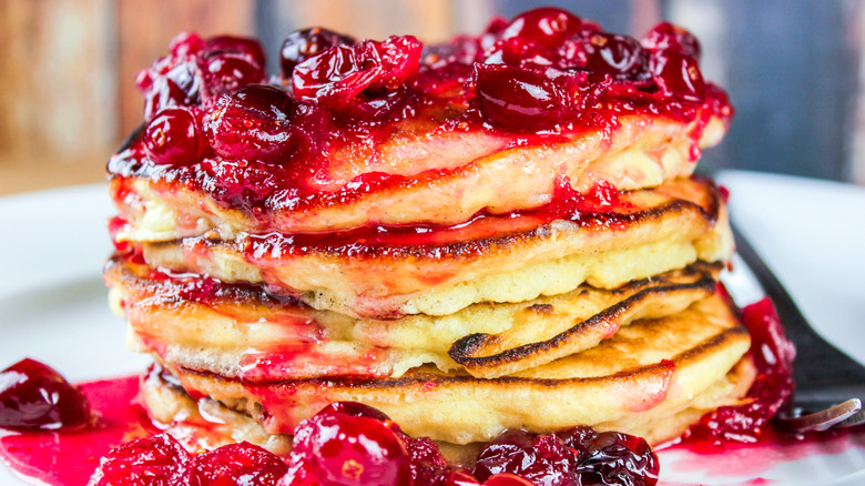 Cranberry sauce on stack of pancakes