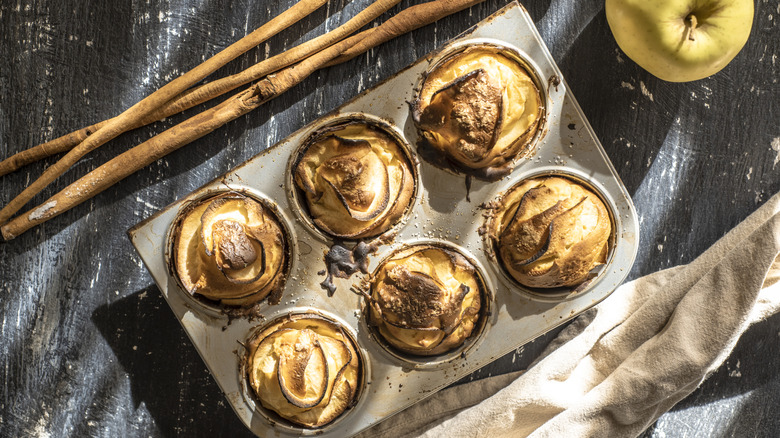 Apple muffins in a tin