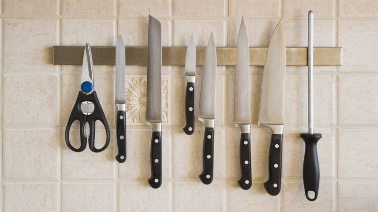 professional knife set on wall