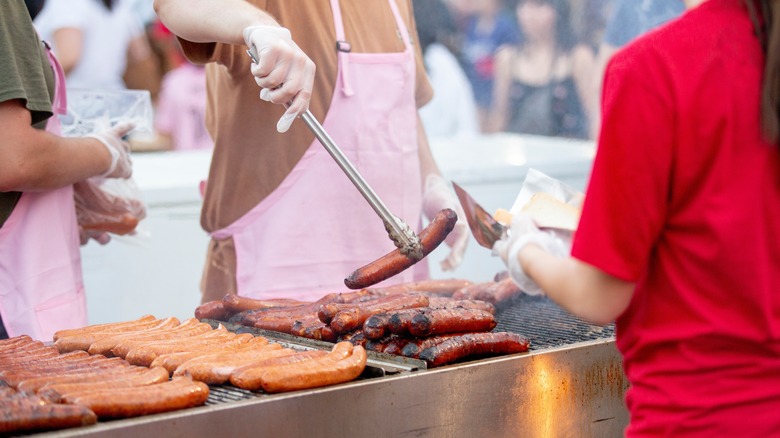 pit masters serving sausages