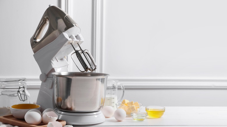 silver stand mixer and ingredients on counter