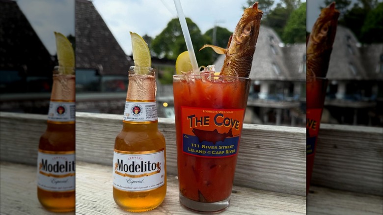 The Chubby Mary at The Cove next to a bottle of Modelito beer garnished with a lime wedge