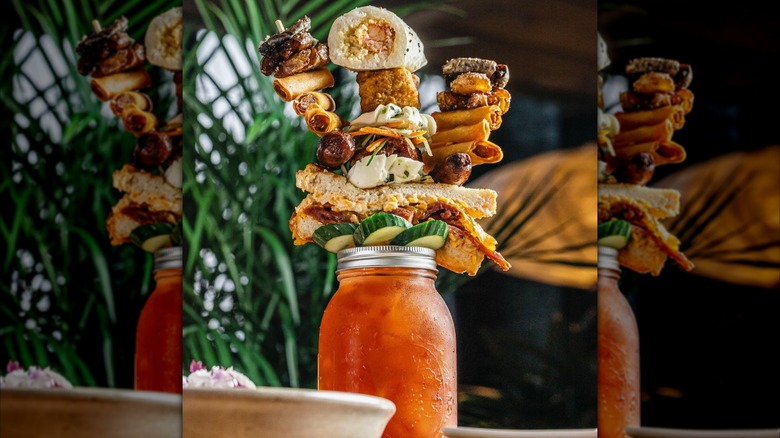 The Sumo Mary at Sunda topped with spring rolls and sushi