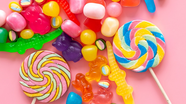 Bright, colorful candy on a pink background