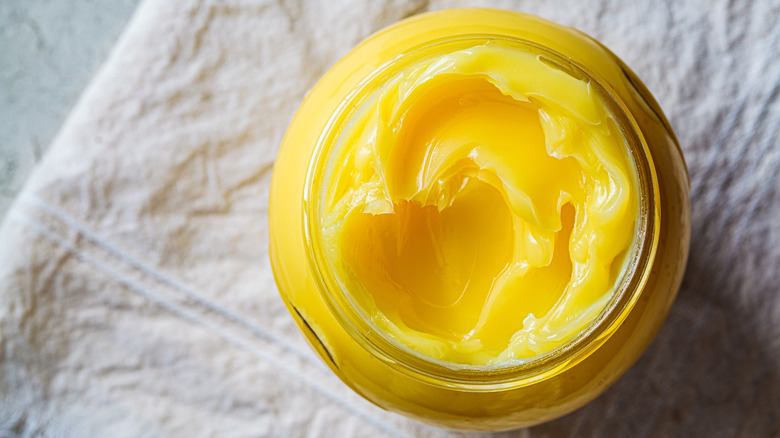 a jar of bright yellow ghee