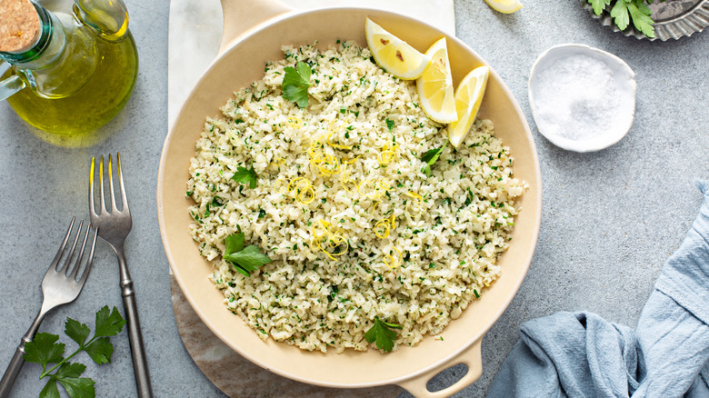 lemon herb cauliflower rice in a serving dish