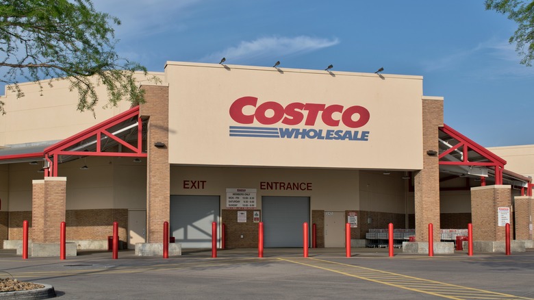 A Costco store front closed with the front doors shut
