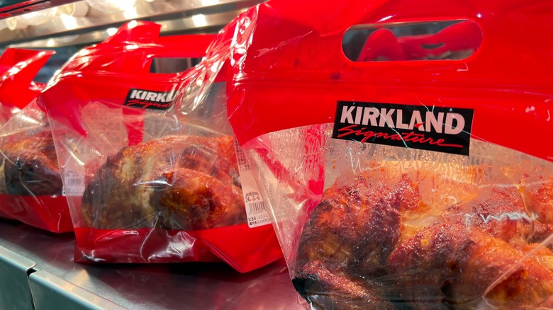 Three bags of Kirkland Signature rotisserie chicken at Costco