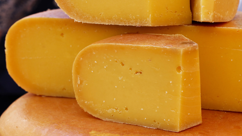 Wedges of Dutch Gouda cheese.