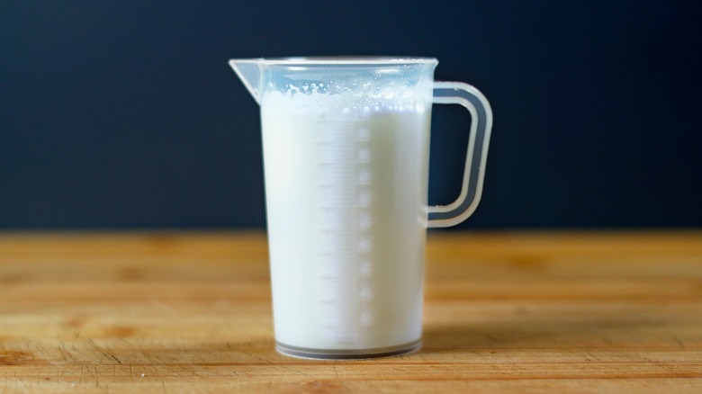 Container of milk on a countertop