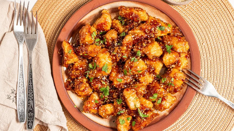 A plate of homemade sesame chicken