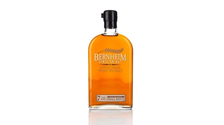 A bottle of Bernheim Original Wheat Whisky outdoors