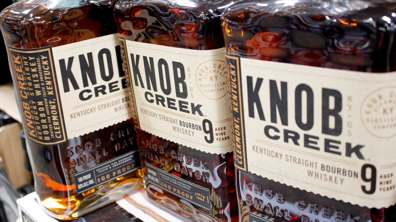 Bottles of Knob Creek 9 Year on a retail store shelf