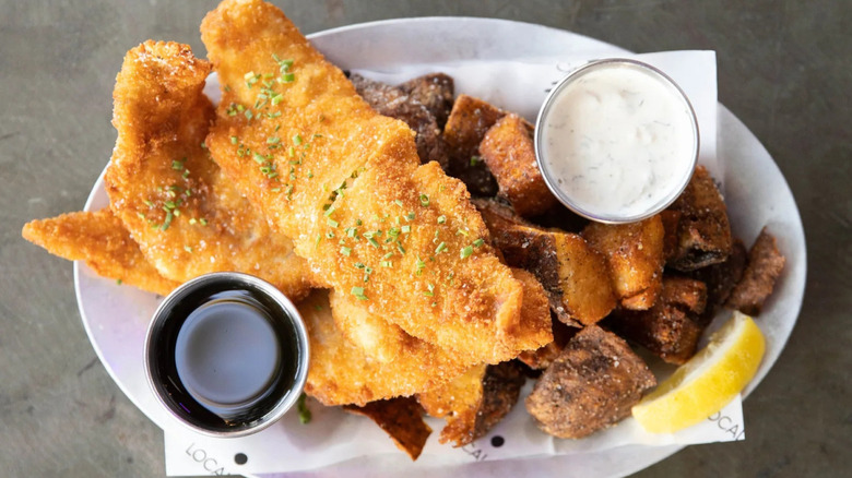 A plate of fried sole and potatoes from Local Tide by Aslan