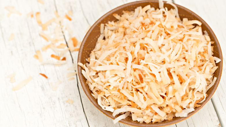 Bowl of toasted coconut flakes