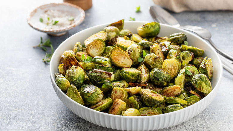 Brussels sprouts in a white bowl