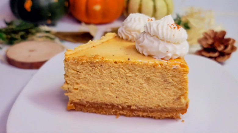 Pumpkin cheesecake with whipped cream