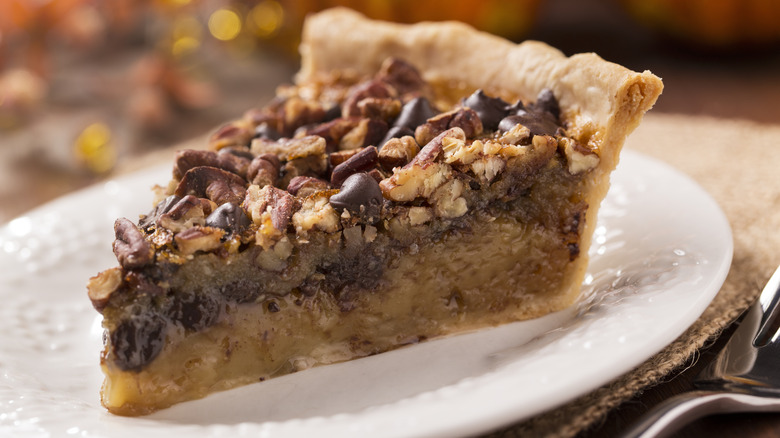 Slice of pecan pie on a plate
