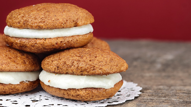 Pumpkin whoopie pies on a table
