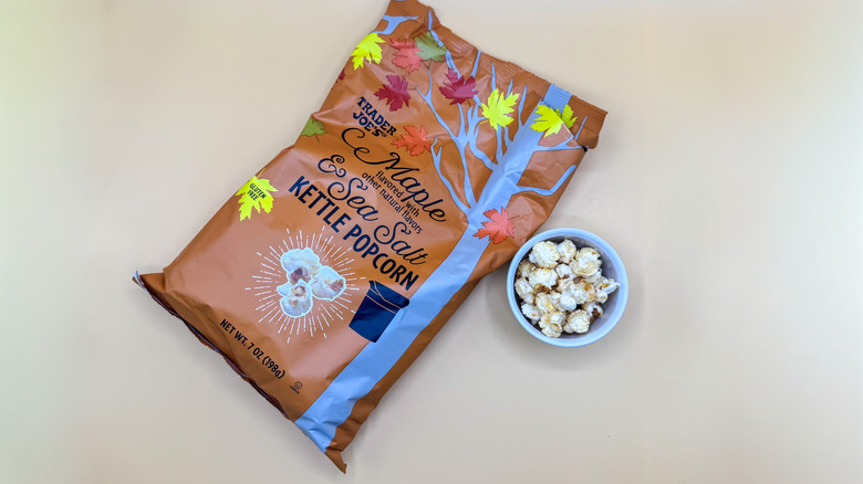 Bag of Maple and Sea Salt Kettle Corn beside a small filled bowl