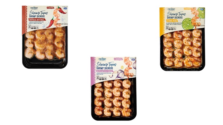 Three packages of shrimp skewers