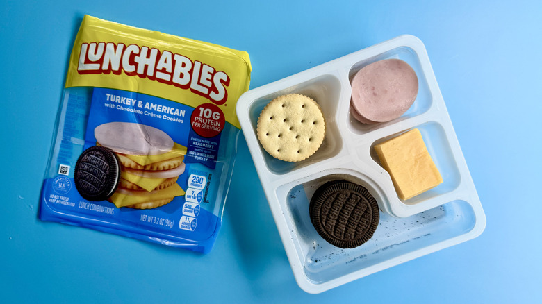 Turkey & American with Chocolate Crème Cookies, opened, on a blue surface