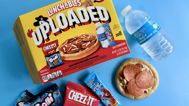 Uploaded Deep Dish Pepperoni Pizza, both the box and all the food items on a blue surface