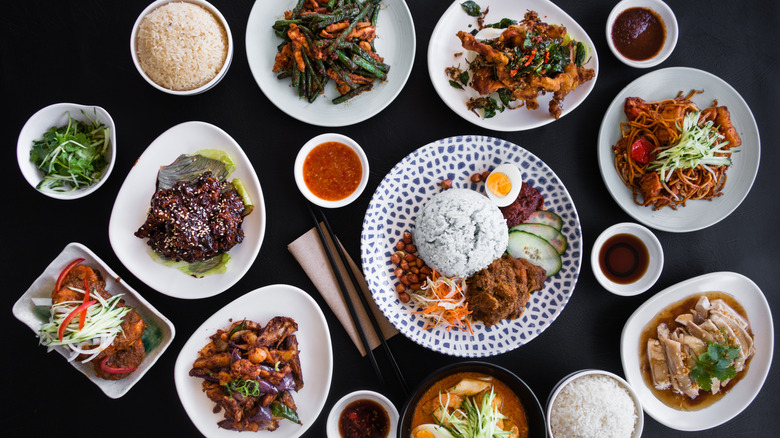 A variety of Malaysian dishes on a table.