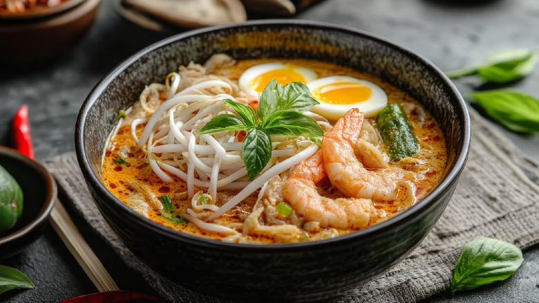 A bowl of laksa noodle soup.