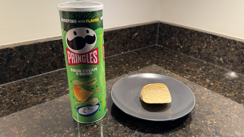 Pringles can on countertop with chips