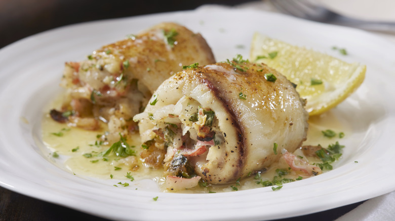 Rolled white fish stuffed with filling