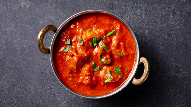 chicken tikka masala in fancy metal bowl