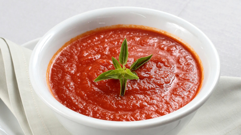 white bowl with pasta sauce