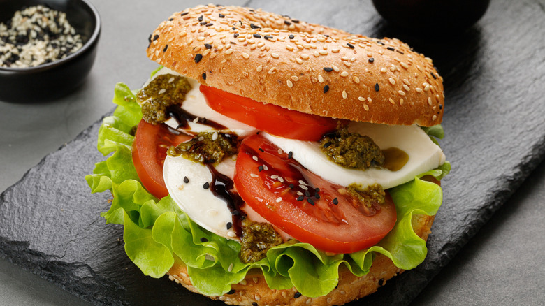 Caprese bagel sandwich with pesto