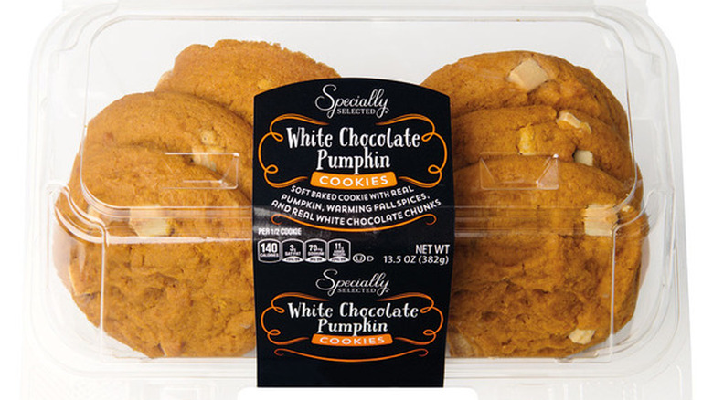 Plastic clamshell package of Specialty Selected White Chocolate Pumpkin Cookies