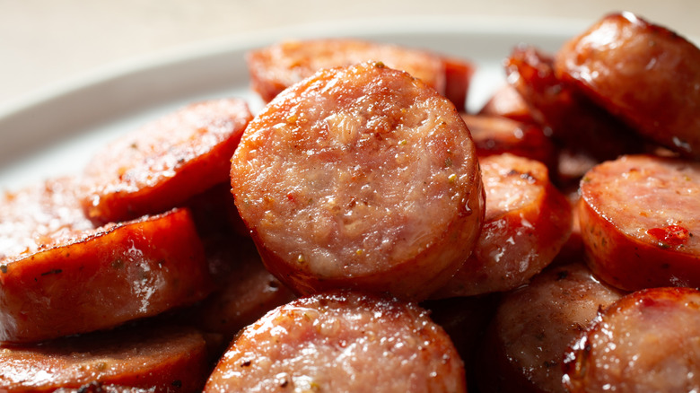 Sliced andouille sausage on a plate
