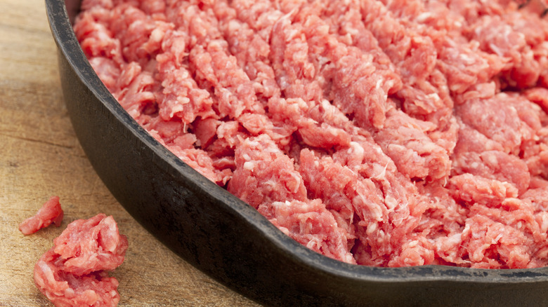 Ground bison in a cast iron pan