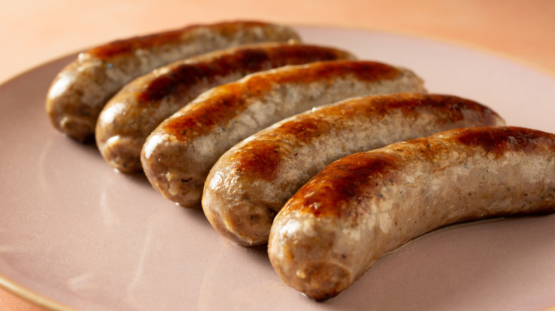 Pan-fried sausages on a plate