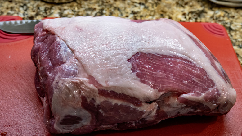Pork shoulder on a cutting board