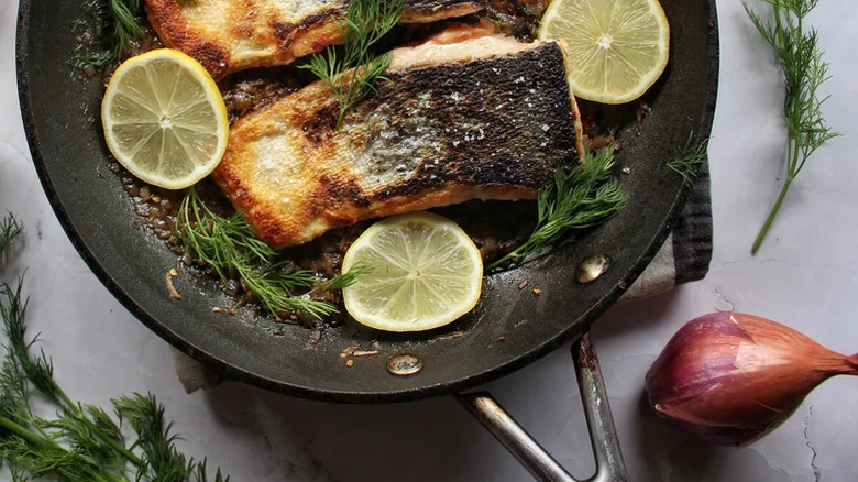 Sauté pan with herby lemon butter salmon filets